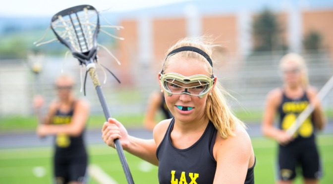 girl playing lacross
