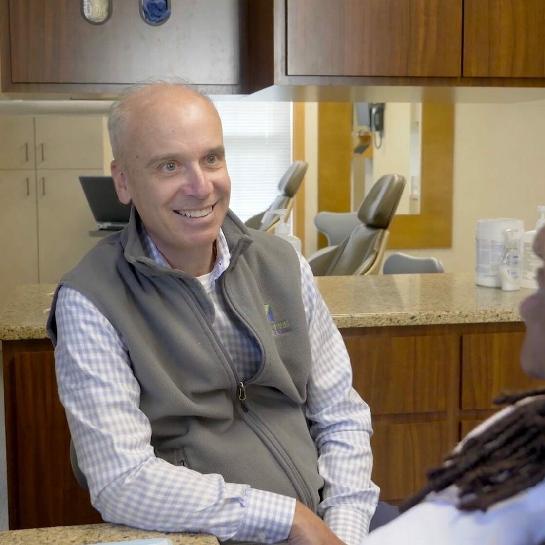 19 Dr. Vermette smiling at a patient